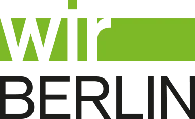 wirBERLIN logo with "wir" in green and "BERLIN" in black text