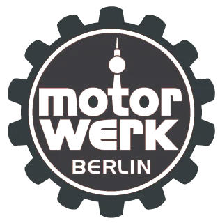 Logo mit Zahnrad, Fernsehturm und Text "motorwerk Berlin"