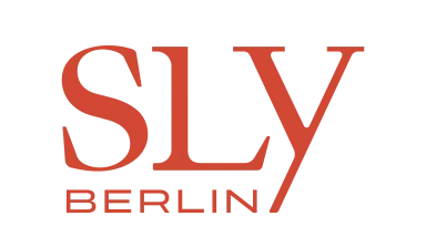 SLY Berlin logo in red-orange letters on transparent background.